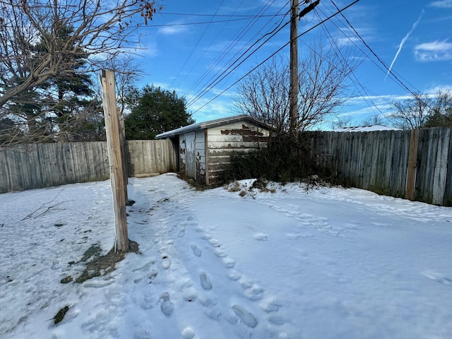 view of yard covered in snow