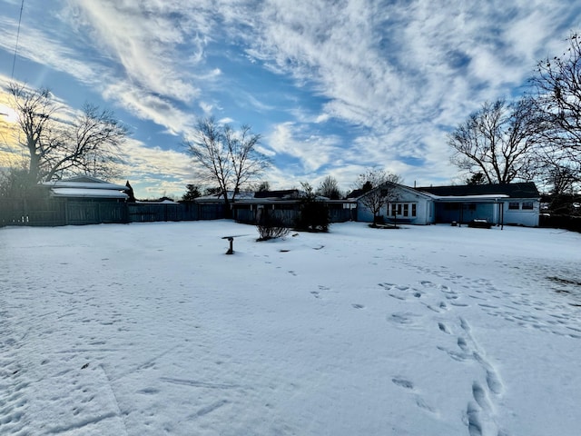 view of yard covered in snow