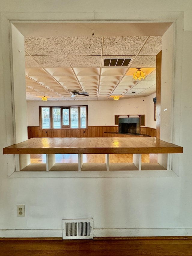 kitchen featuring a paneled ceiling and ceiling fan