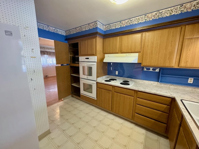 kitchen with white appliances