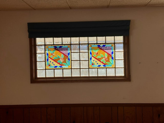 interior details featuring a paneled ceiling