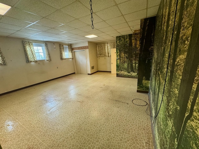 basement with a drop ceiling