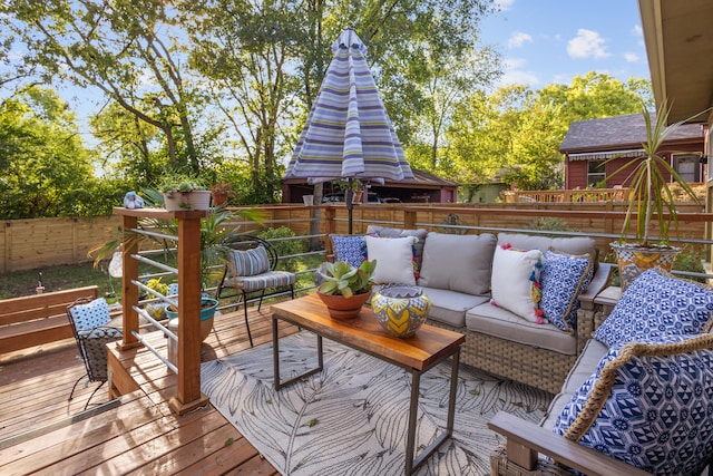 wooden deck with an outdoor living space