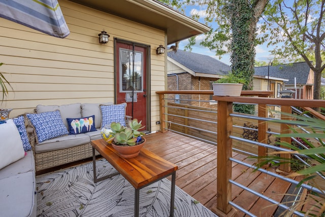 wooden deck with an outdoor hangout area