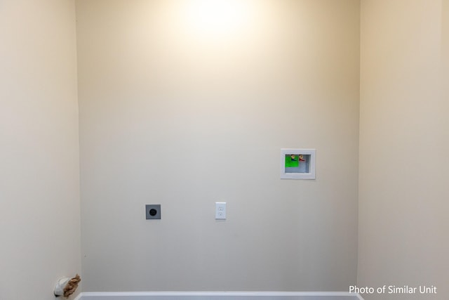 washroom featuring washer hookup and electric dryer hookup