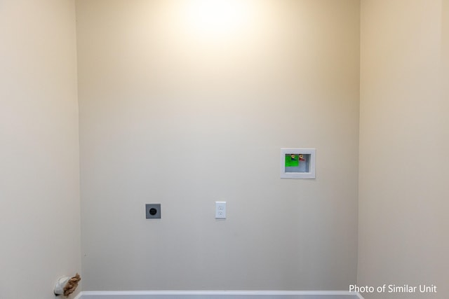 313 Baughman Ave Unit 25, Danville, KY 40422 - washroom with electric dryer hookup, washer hookup, laundry area, and baseboards