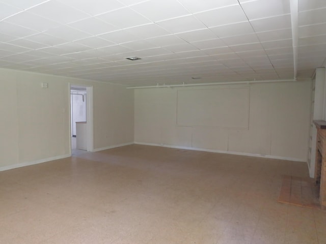 finished basement featuring baseboards