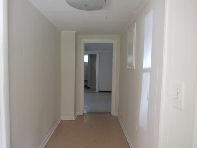 hallway with baseboards