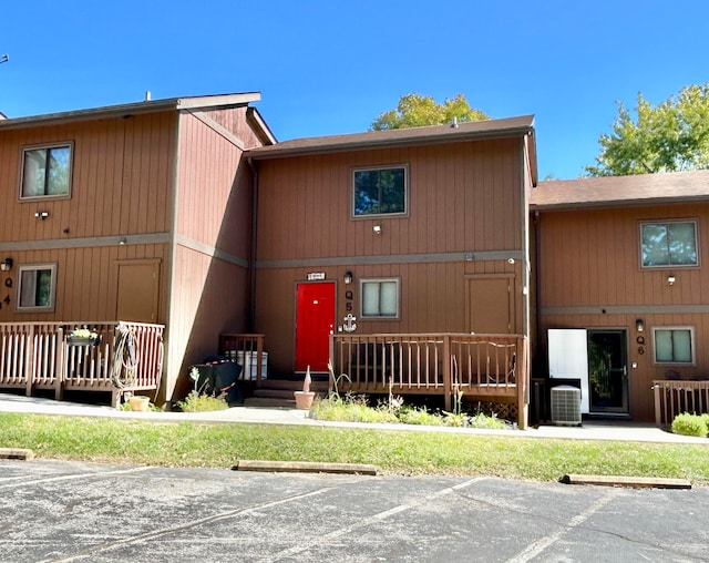 exterior space featuring cooling unit