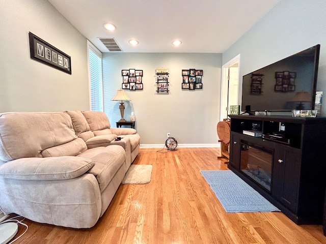 living room featuring light hardwood / wood-style floors