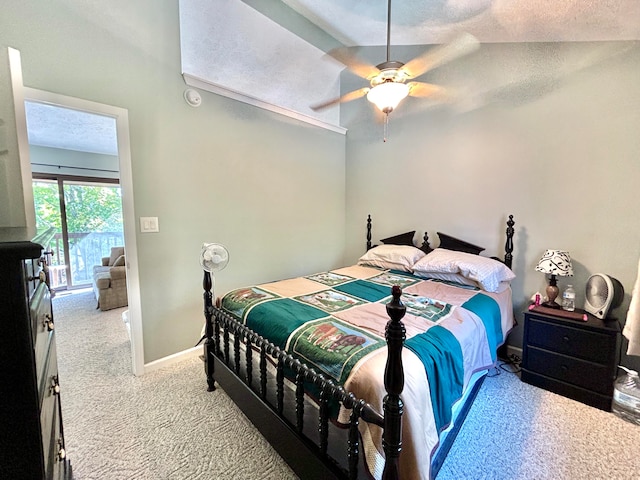 carpeted bedroom featuring lofted ceiling, access to outside, a textured ceiling, and ceiling fan