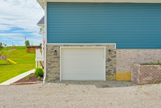 garage with a lawn