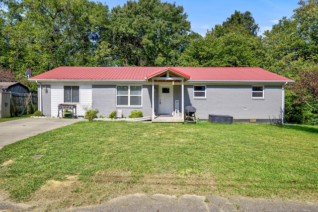 ranch-style house with a front lawn