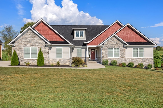 craftsman-style home with a front yard