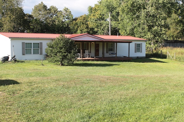 view of front of home featuring a porch and a front lawn