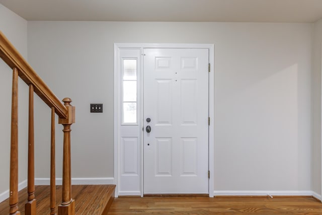 entryway with wood-type flooring