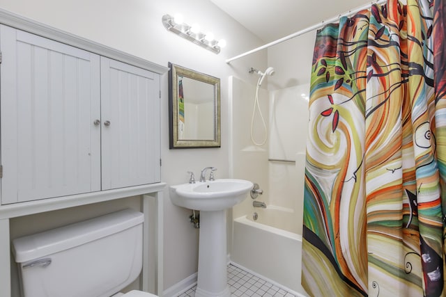 full bathroom with tile patterned flooring, shower / bath combo, sink, and toilet