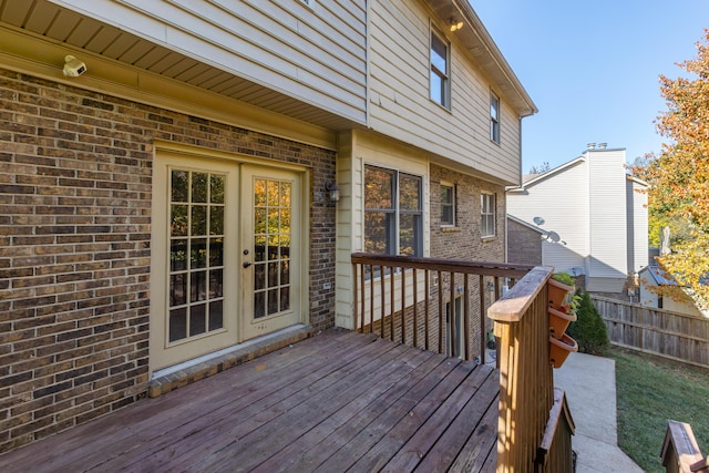 wooden terrace featuring french doors