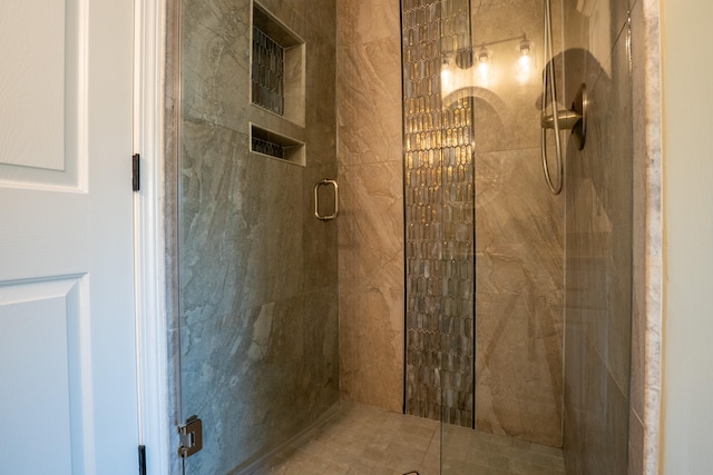 bathroom featuring an enclosed shower