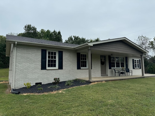 ranch-style house with a front yard