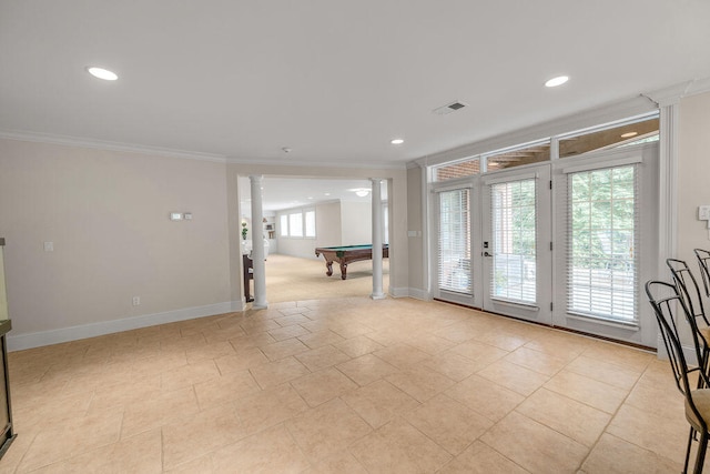 unfurnished room with light tile patterned flooring, billiards, and crown molding