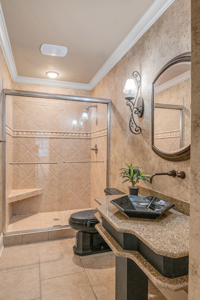 bathroom with ornamental molding, toilet, tile patterned floors, and an enclosed shower