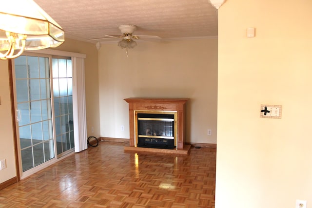 unfurnished living room featuring a textured ceiling, parquet floors, crown molding, and ceiling fan