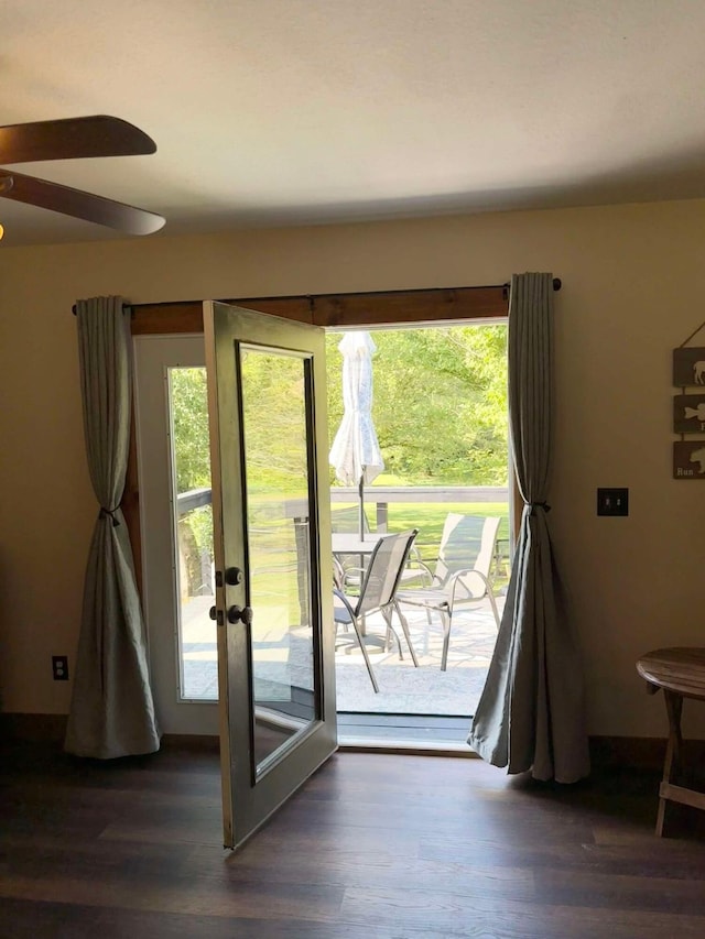 doorway featuring dark hardwood / wood-style floors and french doors