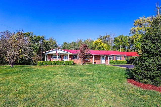 ranch-style house with a front yard