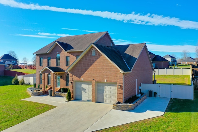 view of front of property featuring a front lawn and a garage