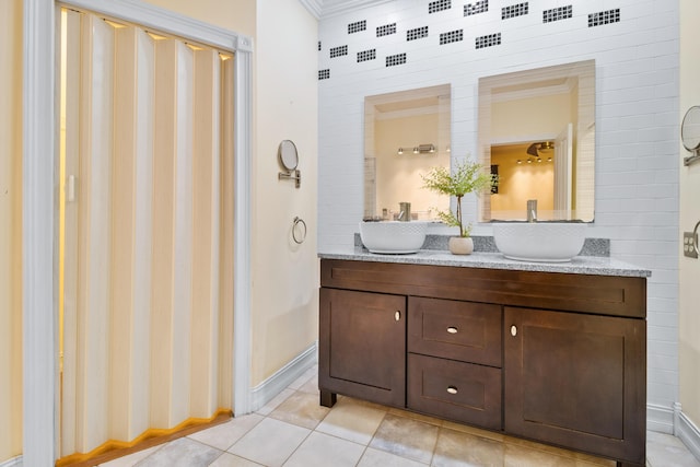 bathroom with vanity, tile patterned floors, and ornamental molding