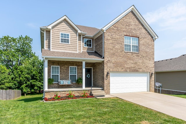 view of front facade featuring a garage, a porch, and a front lawn