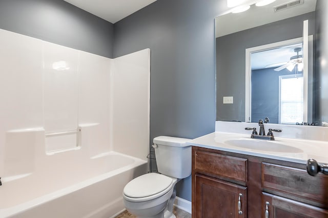 full bathroom featuring ceiling fan, vanity, toilet, and shower / washtub combination