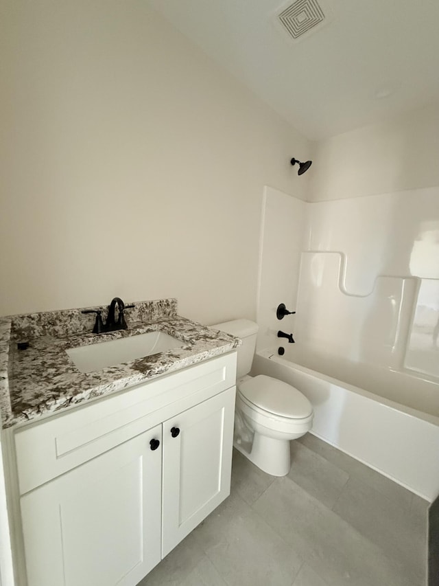 full bathroom with tile patterned floors, vanity, toilet, and shower / bath combination