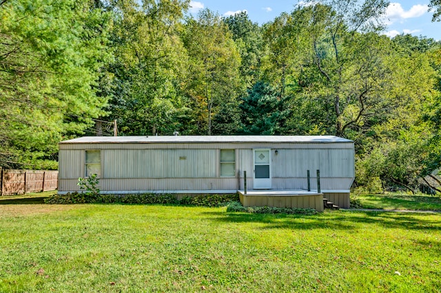 view of front of property with a front lawn