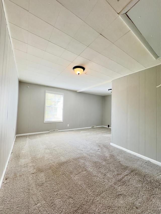 basement with carpet flooring