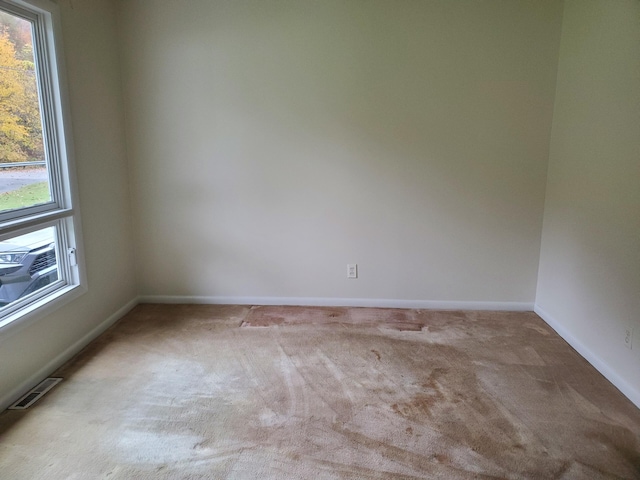 empty room with light carpet