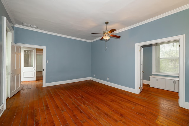 unfurnished bedroom featuring ceiling fan, hardwood / wood-style floors, and ornamental molding