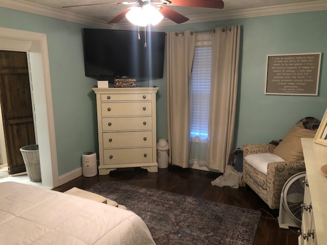 bedroom with ceiling fan, baseboards, dark wood finished floors, and crown molding