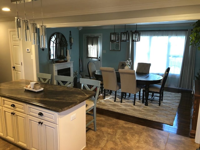 dining area featuring ornamental molding