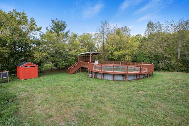 view of yard with a deck and a shed