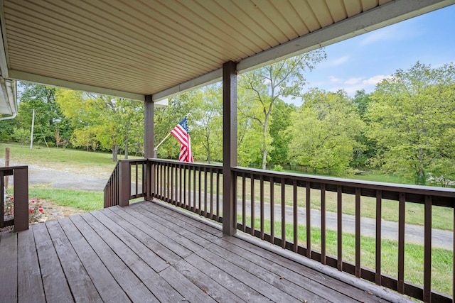 deck featuring a lawn