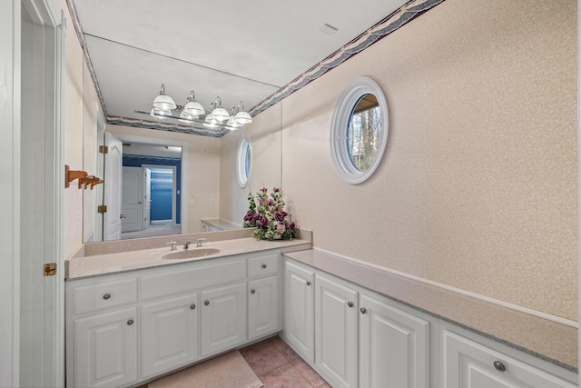 bathroom featuring vanity and tile patterned flooring