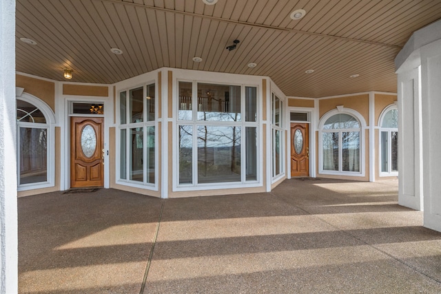 doorway to property featuring a patio