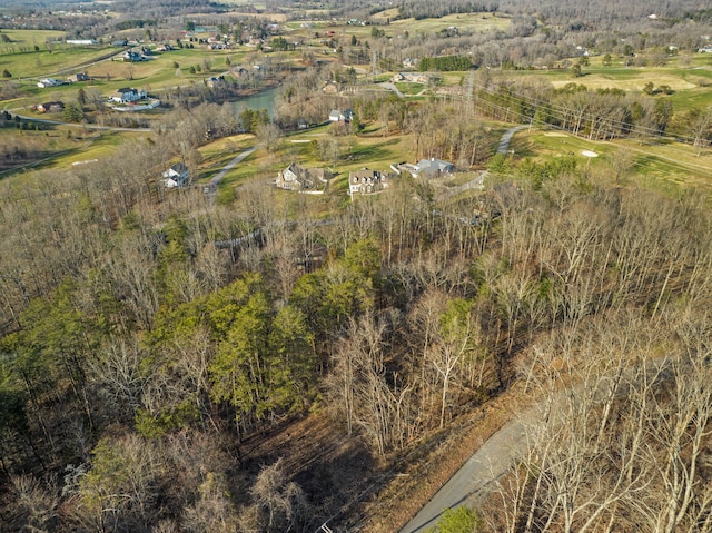 birds eye view of property featuring a rural view