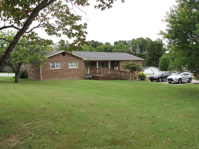 single story home featuring a front yard