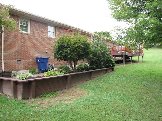 view of yard with a deck