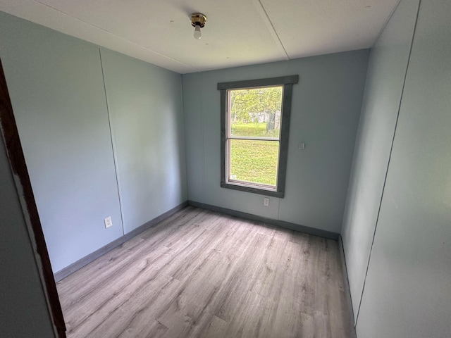 empty room with light wood-type flooring