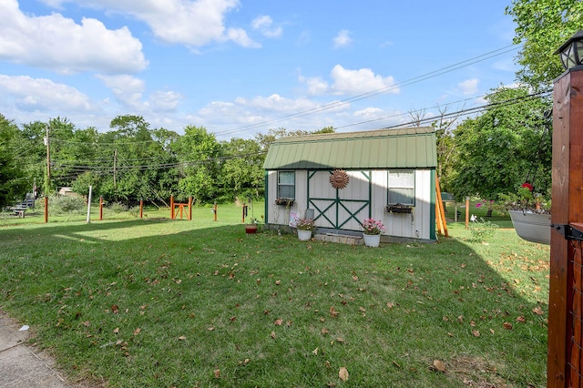 view of yard featuring a storage unit