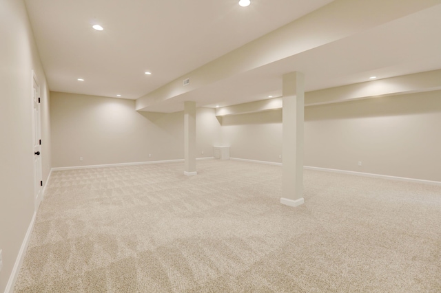 basement with light colored carpet